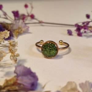 Anillo ajustable de acero inoxidable con PURPURINA HOLOGRÁFICA encapsulada en resina.