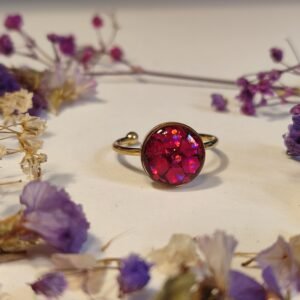 Anillo ajustable de acero inoxidable con PURPURINA HOLOGRÁFICA encapsulada en resina.