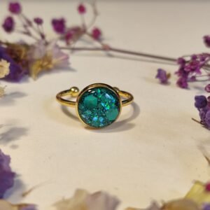 Anillo ajustable de acero inoxidable con PURPURINA HOLOGRÁFICA encapsulada en resina.