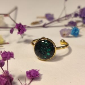 Anillo ajustable de acero inoxidable con PURPURINA HOLOGRÁFICA encapsulada en resina.