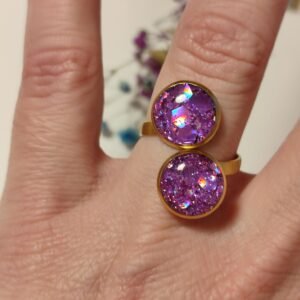 Anillo ajustable de acero inoxidable con PURPURINA HOLOGRÁFICA encapsulada en resina.