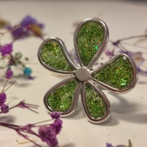 Anillo ajustable de acero inoxidable con PURPURINA HOLOGRÁFICA encapsulada en resina.